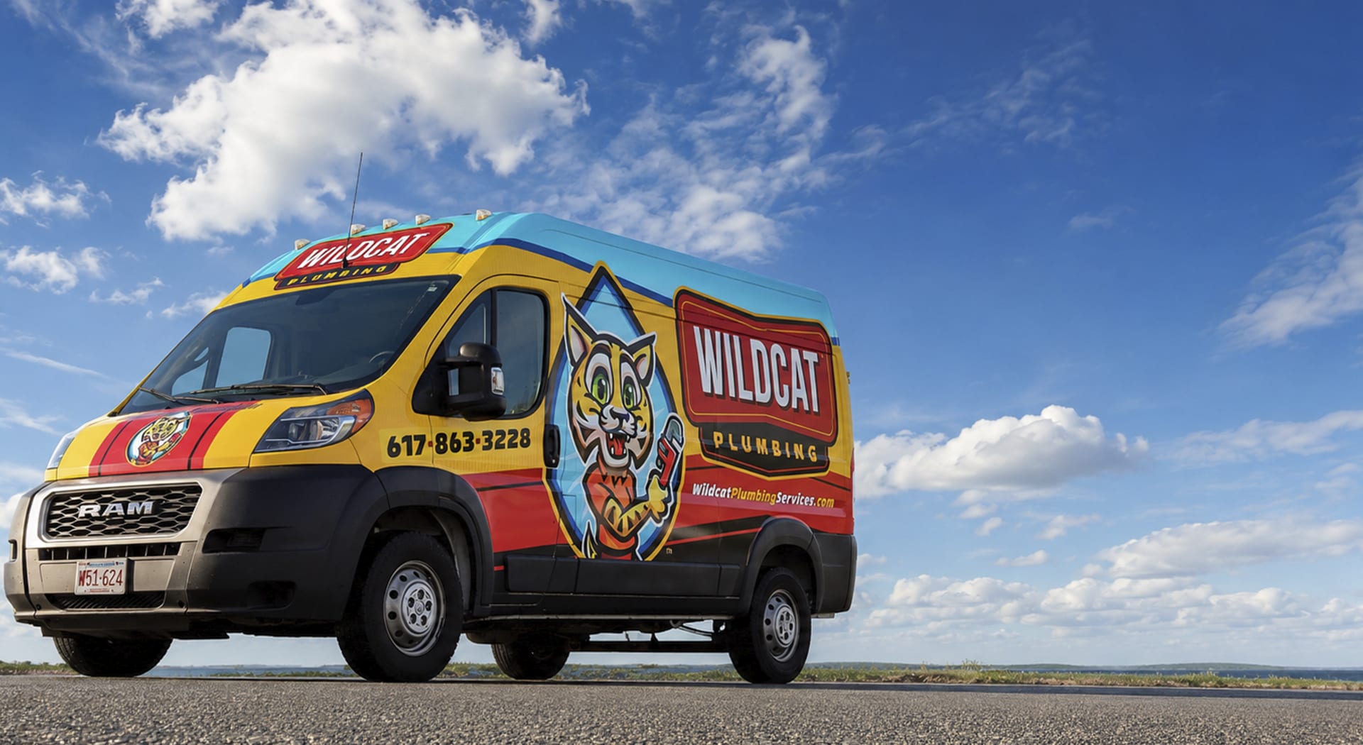 Wildcat Plumbing branded service van on the road